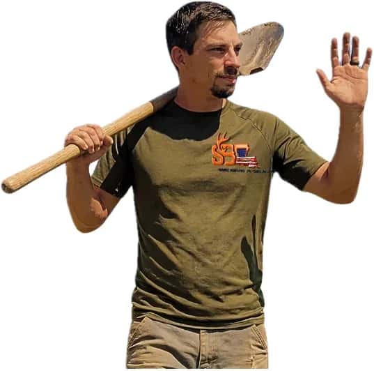 Michael Dantone, owner of Southern Buck Lawn, in a branded shirt with a shovel. Owner photo, not a Watson house.